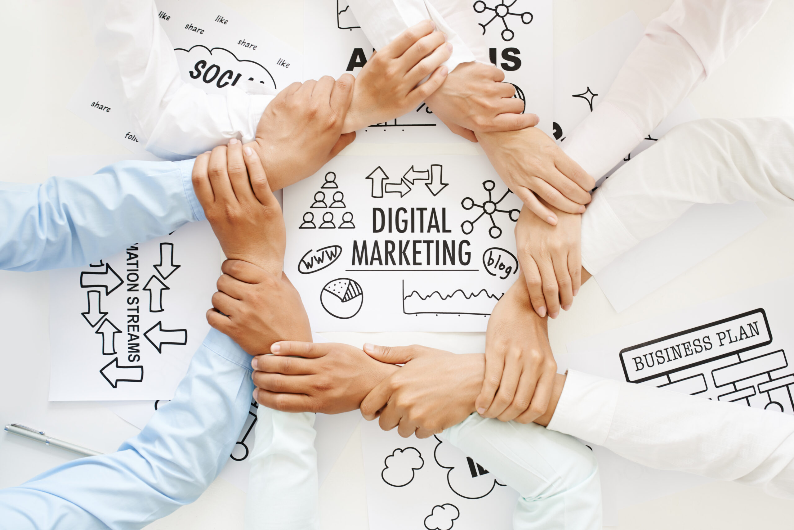 What is Digital Marketing An infographic of various hands holding each other symbolizing the sign of unity and teamwork of digital marketing.